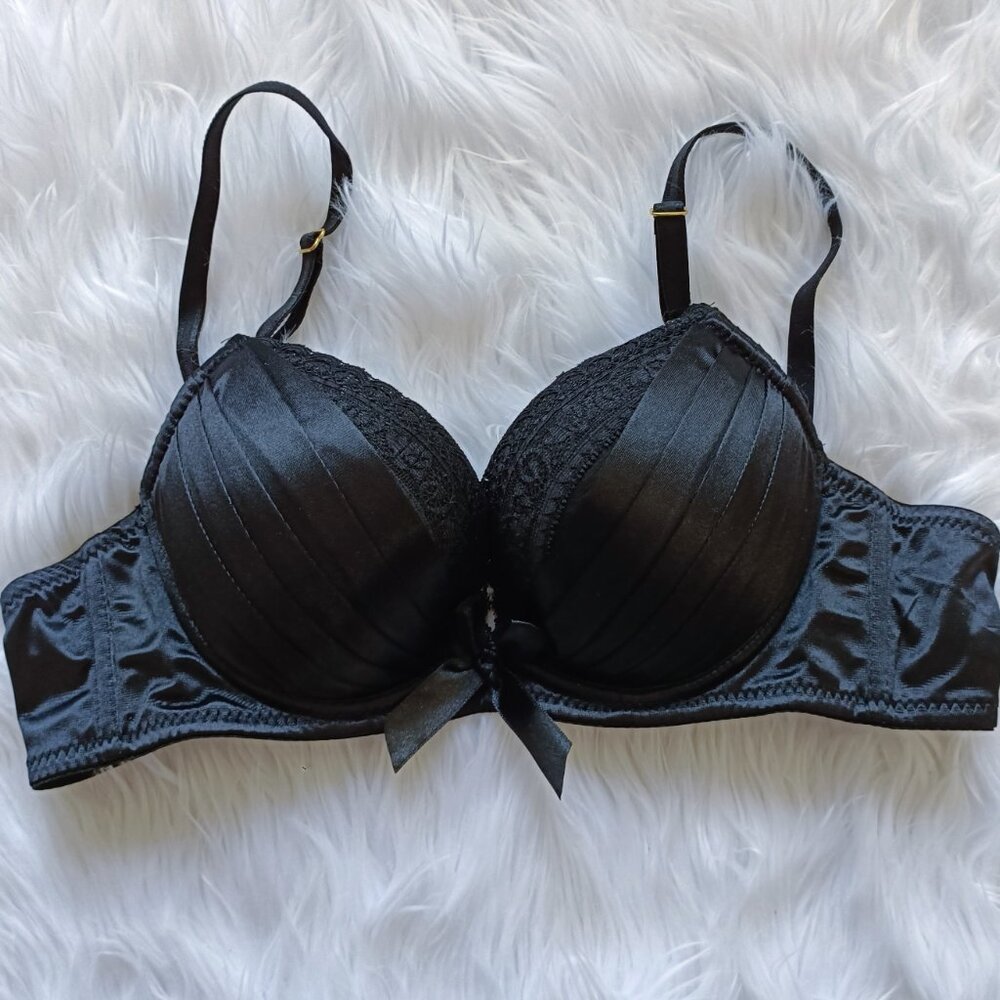 Black satiny push-up bra with bow and lace accents